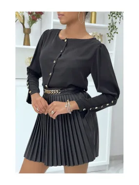 Blouse noire à boutons dorés