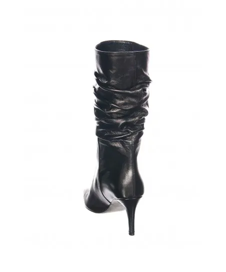 Botte à talon cuir noir plissée style année 80 de chez Osmose